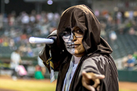 National Night Out event with person dressed up as skeleton