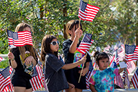 Kids with flags at Star Spangled 4th event